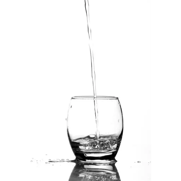 Water being poured into a glass.