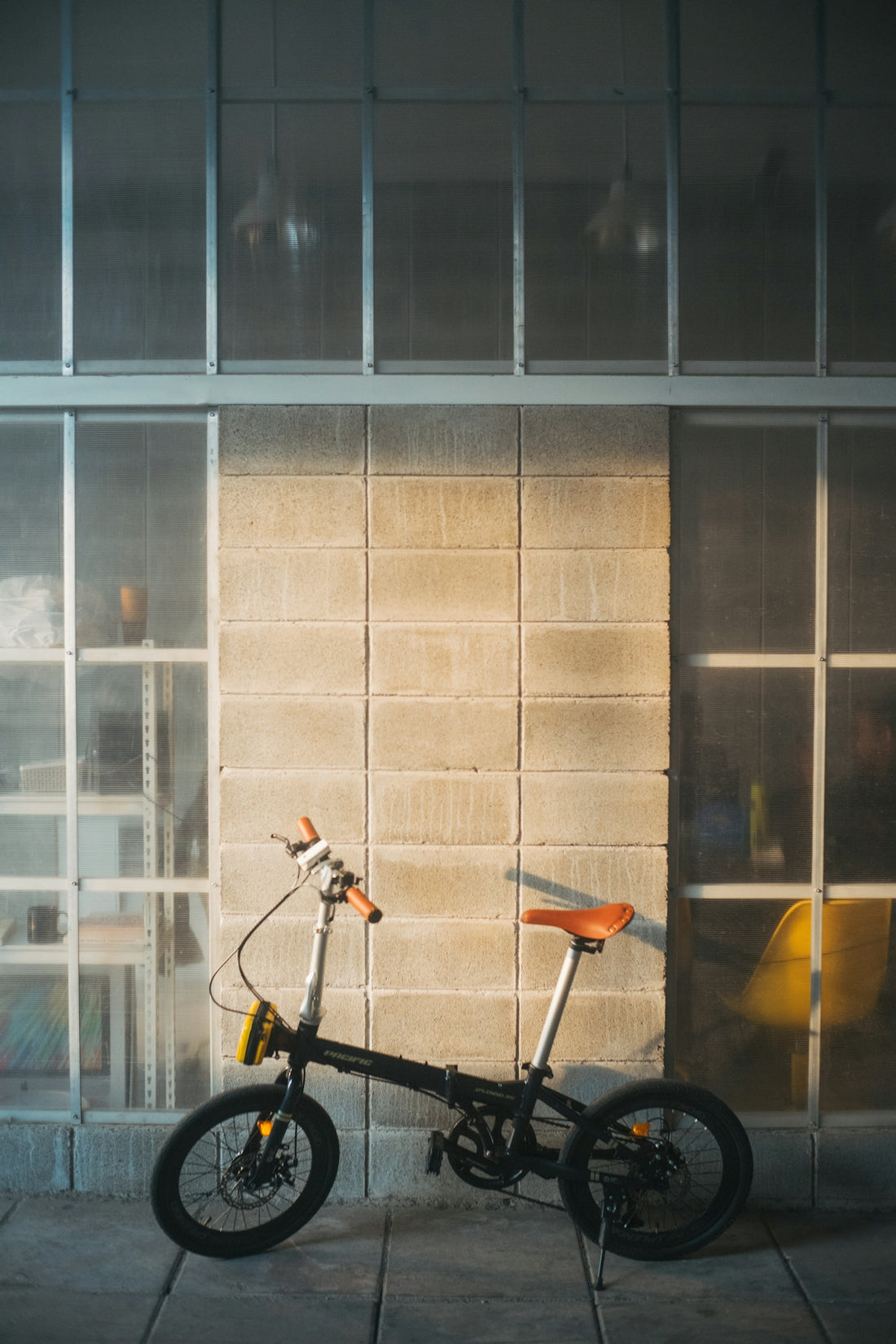 a bicycle parked in front of a building